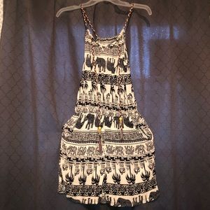 White and black romper. Details on pictures.